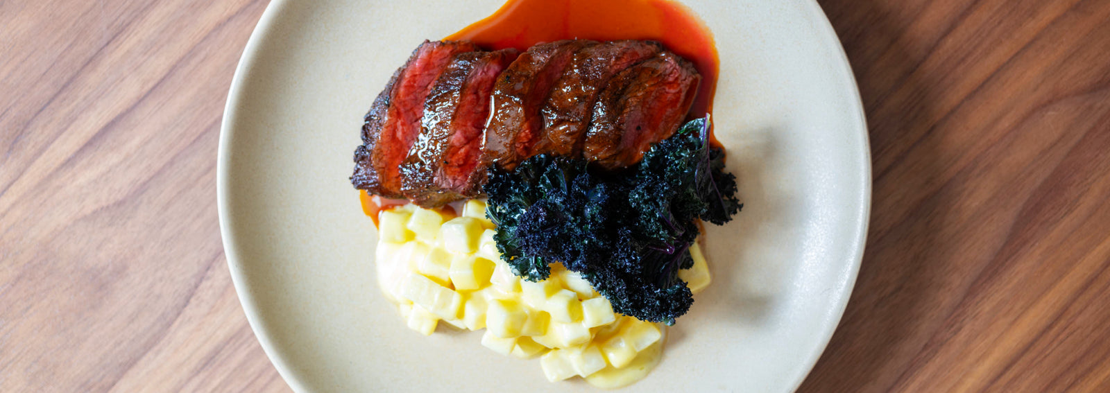 Loin of Venison with Citrus Celeriac and Red Kale